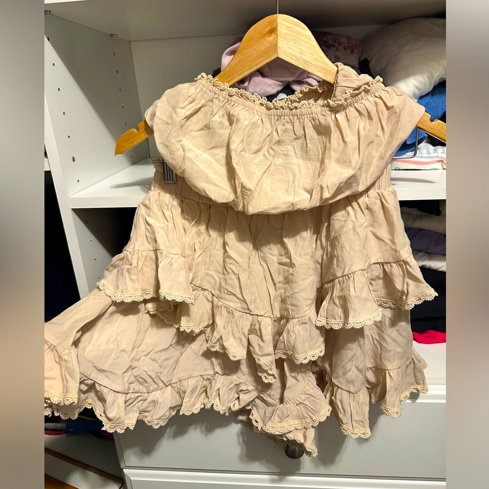 Two pieces tube top/shorts. Size medium
